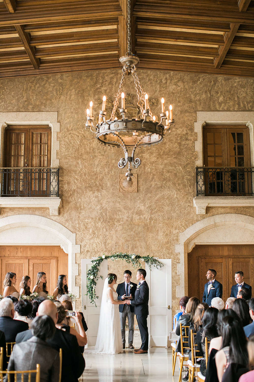 wedding ceremony at the fairmont banff springs hotel with couple looking toward each other