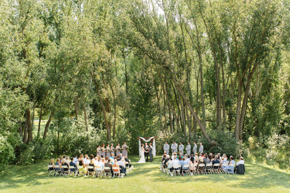 wide shot of a beautiful outdoor wedding ceremony in Calgary